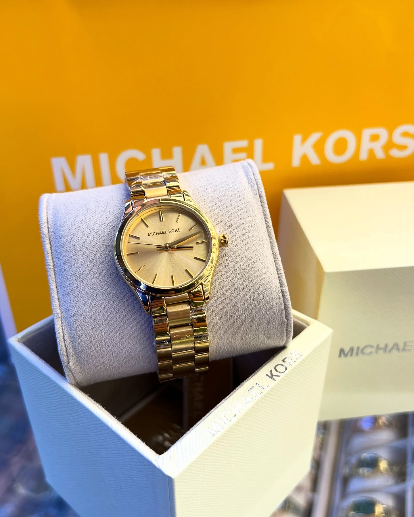montre michael kors Gold Runway slim gold dial