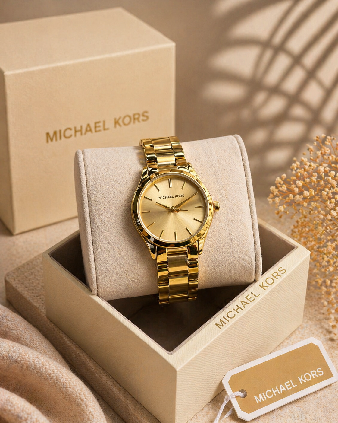 montre michael kors Gold Runway slim gold dial