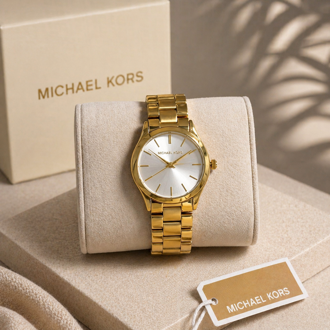 montre michael kors Gold Runway slim White dial